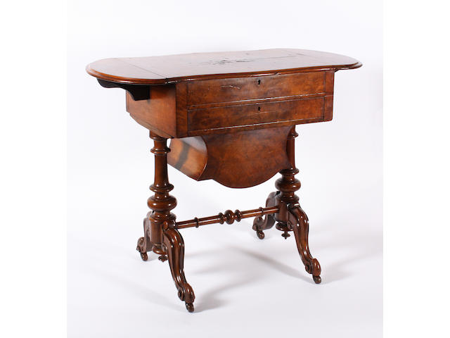 A Victorian walnut work table