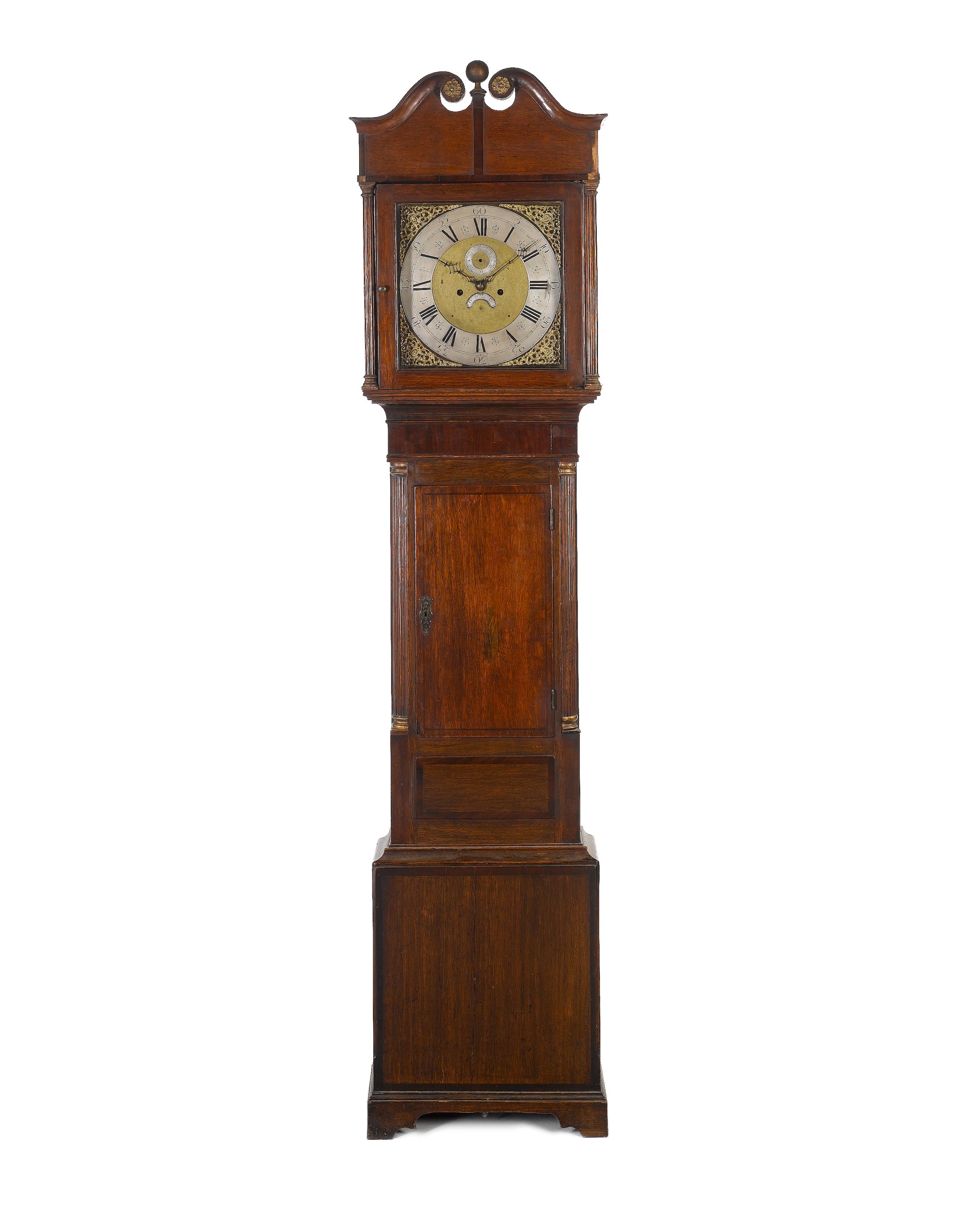 An oak longcase clock