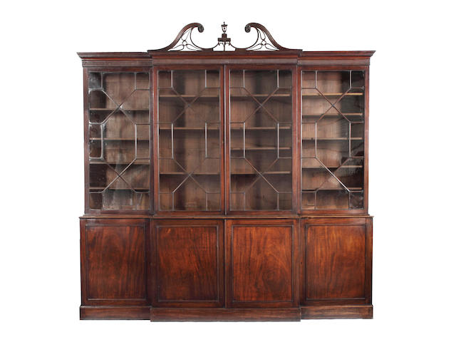 A late George III mahogany breakfront library bookcase