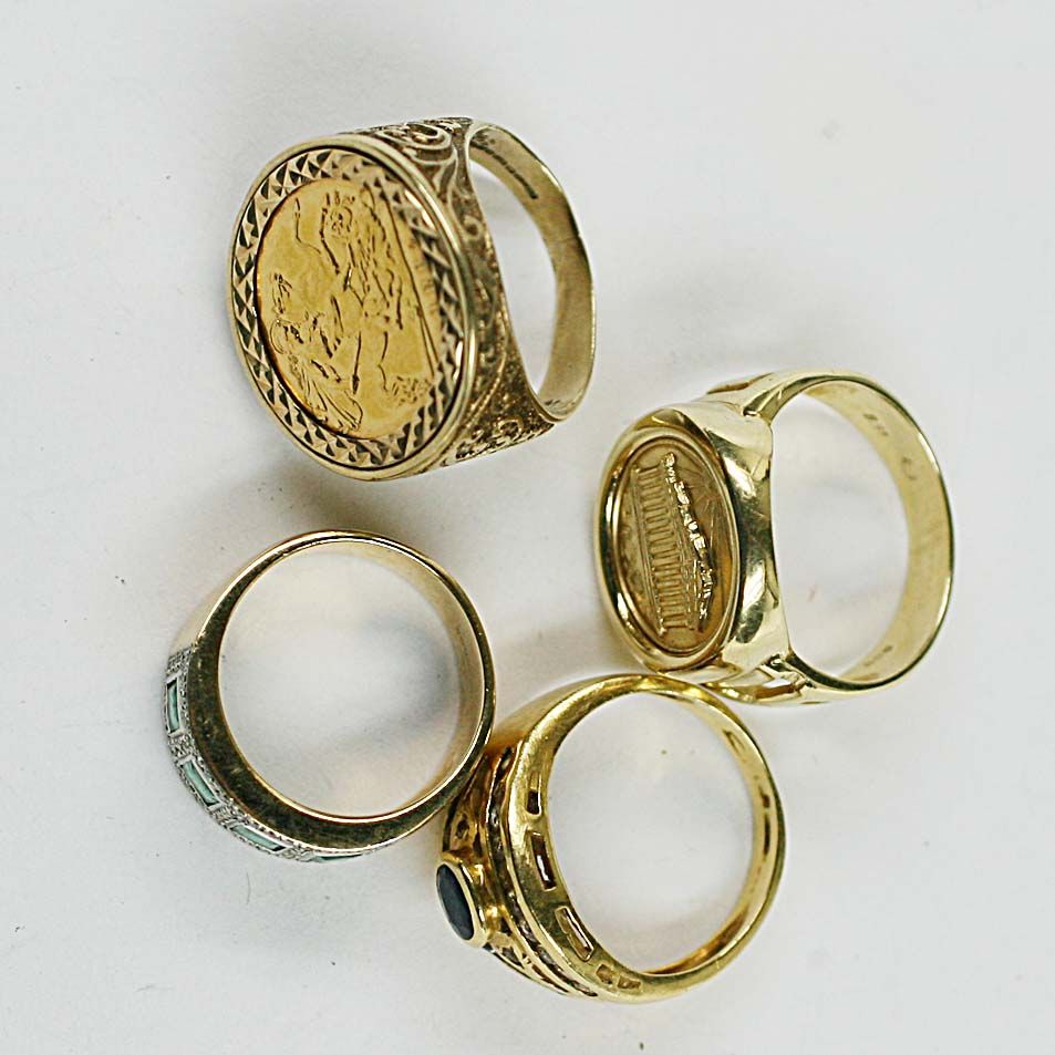 Four assorted rings (4)