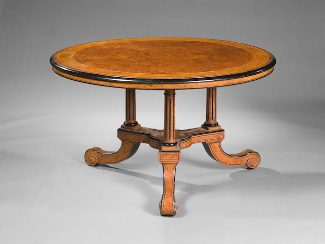 A Victorian amboyna, ebonised and boxwood strung breakfast table