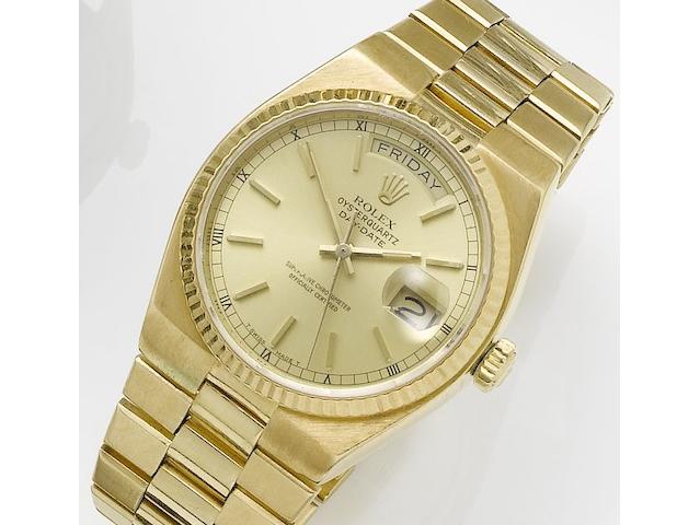 Rolex. An 18ct gold quartz centre seconds calendar bracelet watchOysterquartz, Day-Date, Ref:19018, Circa 1977