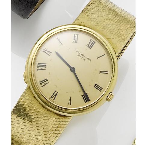 Patek Philippe. An 18ct gold automatic bracelet watch