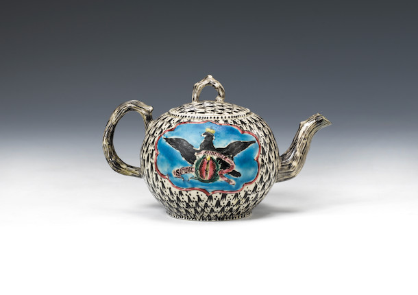 A Staffordshire salt-glazed stoneware 'King of Prussia' teapot and cover circa 1760 image 2