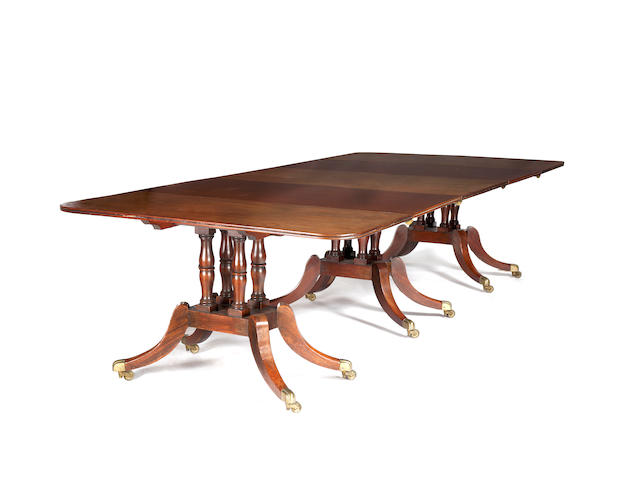 A late George III mahogany extending dining table