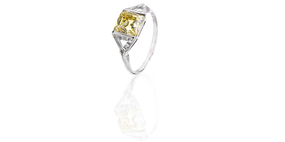 An early 20th century yellow diamond and diamond ring, French