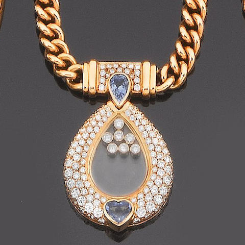 A sapphire and diamond 'Happy Diamond' pendant necklace and earring suite, by Chopard (2)