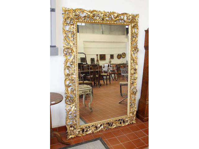 A Florentine style giltwood mirror,