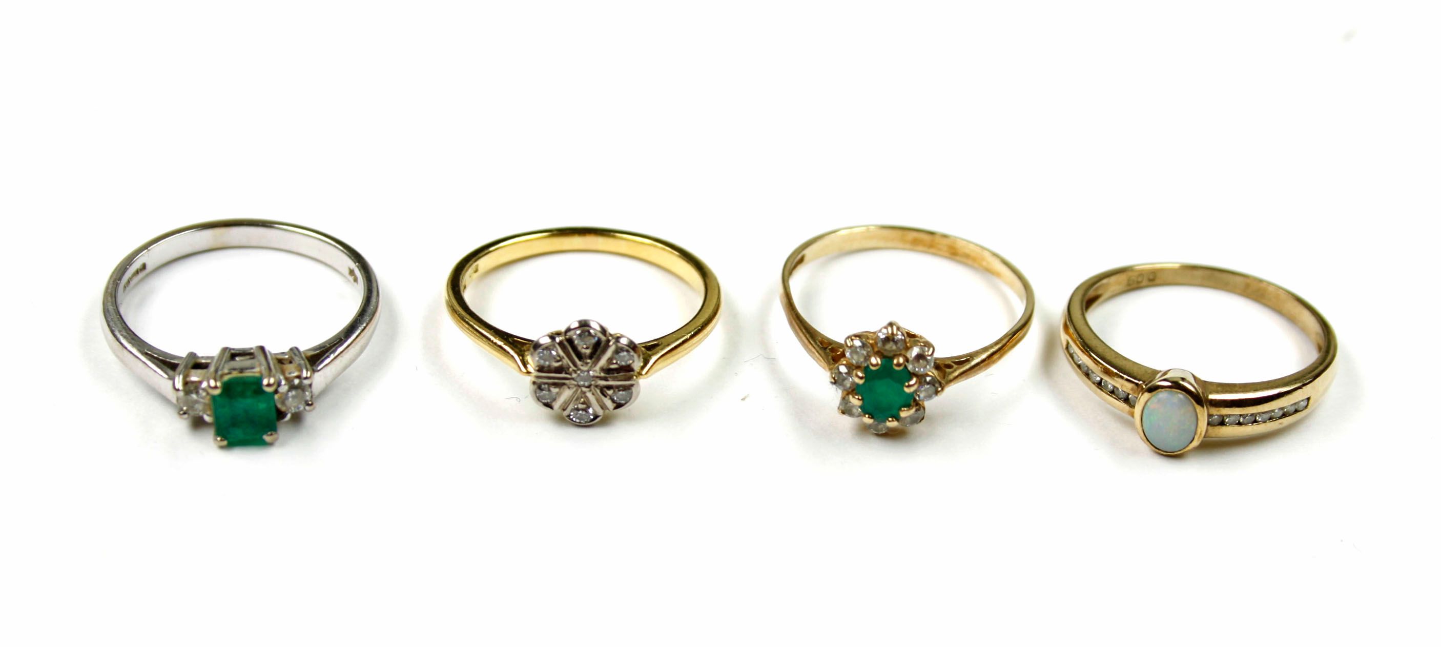 Three gem set rings, (4)