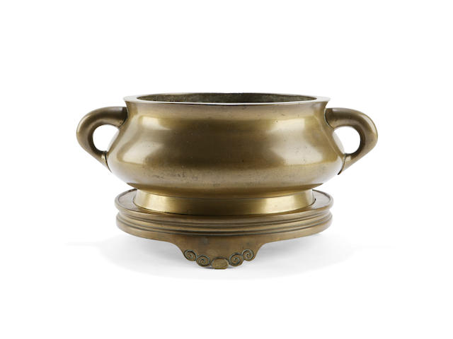 A bronze shallow bomb&#233; censer on stand Bearing an apocryphal Xuande six character mark but 19th century