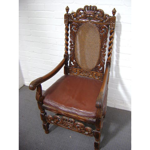 A set of seven Charles II style walnut dining chairs,