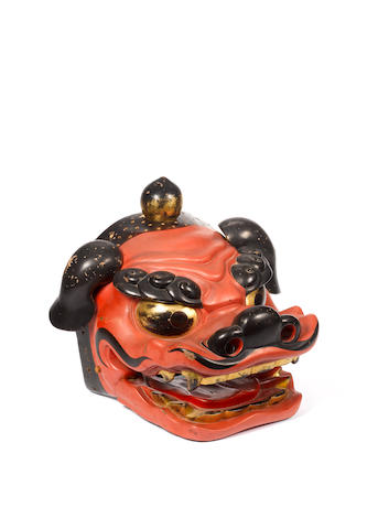 A large red-lacquered wood shishimai mask Carved by Hasegawa Fujishige and lacquered by Kitagaki Ihei, dated Bunsei 4 (1821)
