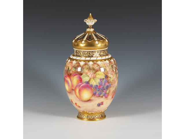 A Royal Worcester fruit painted vase and cover by John Freeman Circa 1970.