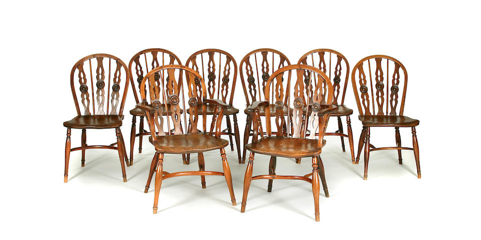 A set of eight yew, elm and ash Windsor chairs, to include two open armchairs, attributed to the Prior Workshop, Uxbridge