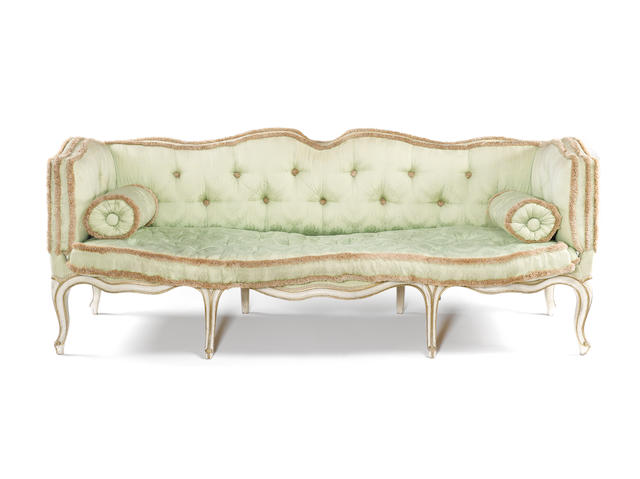 A late 19th century Louis XV style white painted and parcel gilt sofa