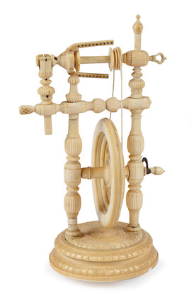 miniature spinning wheel made of ivory