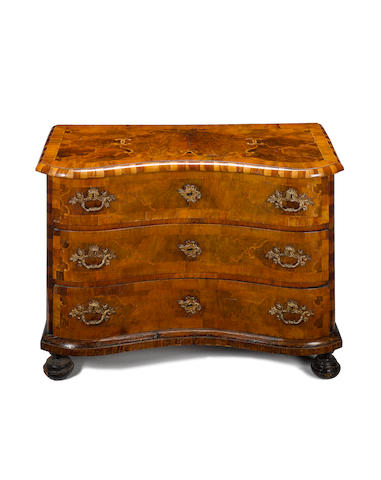A German 18th century walnut, burr walnut and fruitwood parquetry commode