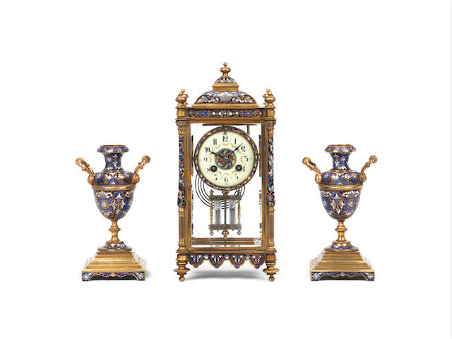A champleve enamel three piece  clock garniture Samuel Marti, early 20th century, French 3