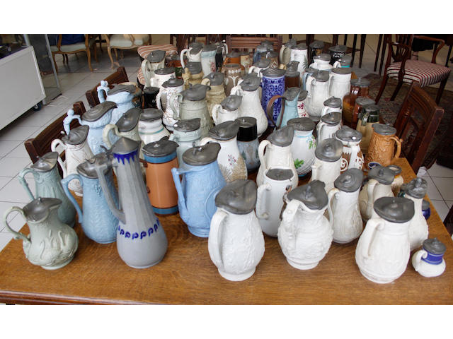 A large collection of 19th Century Staffordshire saltglazed jugs