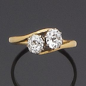 A diamond two-stone crossover ring