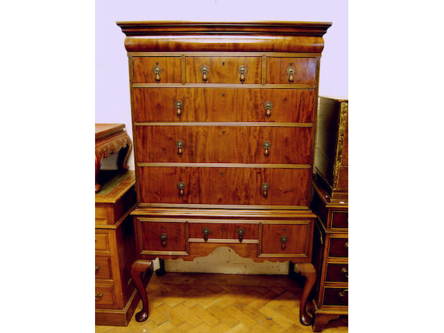 A walnut chest on stand, in early 18th Century style