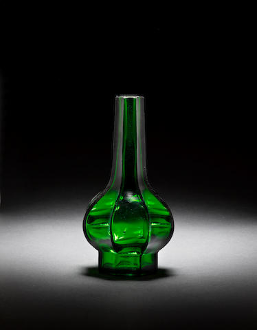 An octagonal facetted green glass bottle vase Qianlong wheel-cut four-character mark and of the period