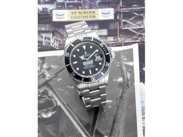 Rolex. A rare stainless steel automatic centre seconds divers watch made for Comex together with divers log books, rare photographs and other related materialSubmariner, 'Comex 6150' Ref:16800, Serial No.8274602, 1984