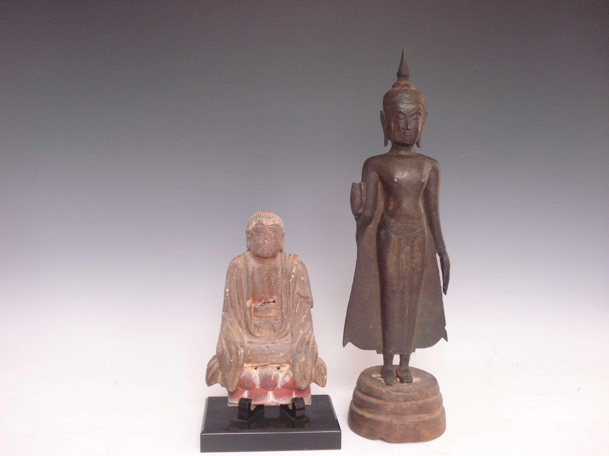 Two Buddha figures