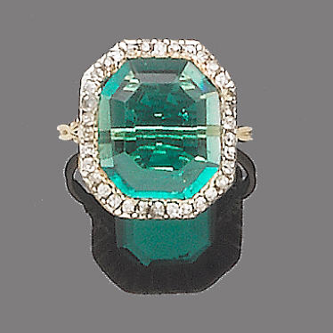 An early 19th century emerald and diamond dress ring