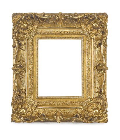 A Louis XV carved, pierced, swept and gilded frame