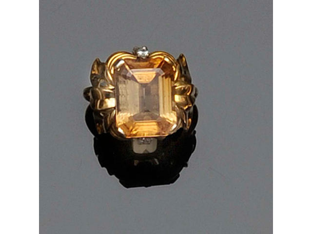 A topaz and diamond dress ring