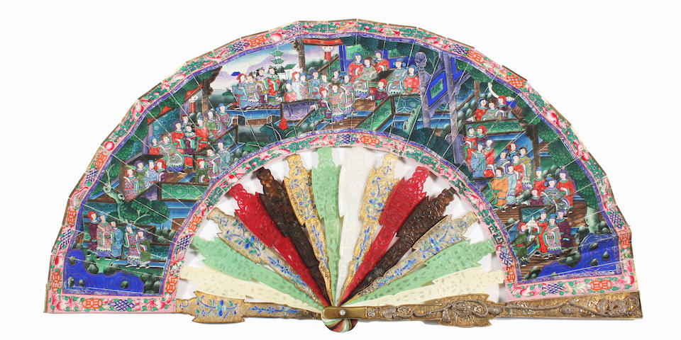 A Cantonese early 20th century fan with sticks of varying materials and a painted leaf