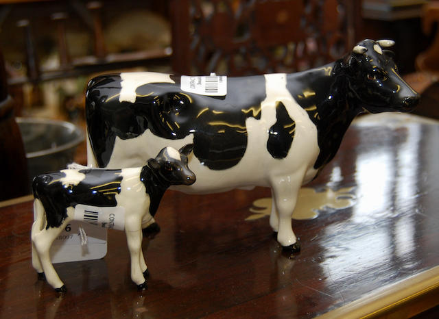 A Beswick cow and calf
