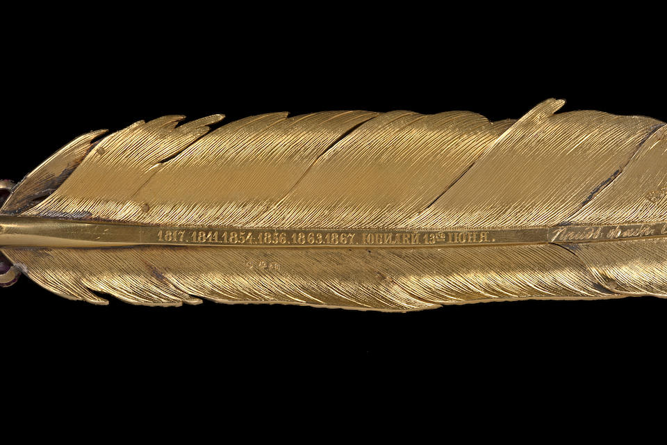An important commemorative jewelled gold and silver-gilt presentation quill pen Sazikov Firm, St. Petersburg, 1867  length: 33cm (13 1/4in).