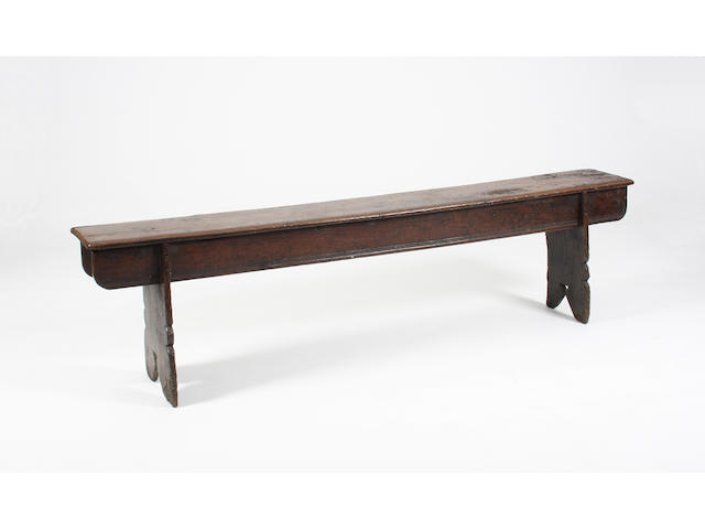 An exceptionally rare early Elizabethan oak boarded bench