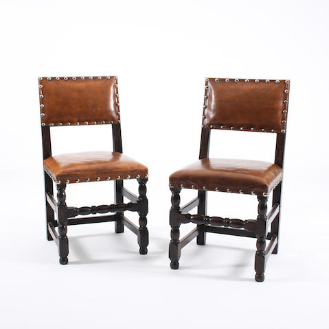 A set of eight oak Commonwealth-style dining chairs