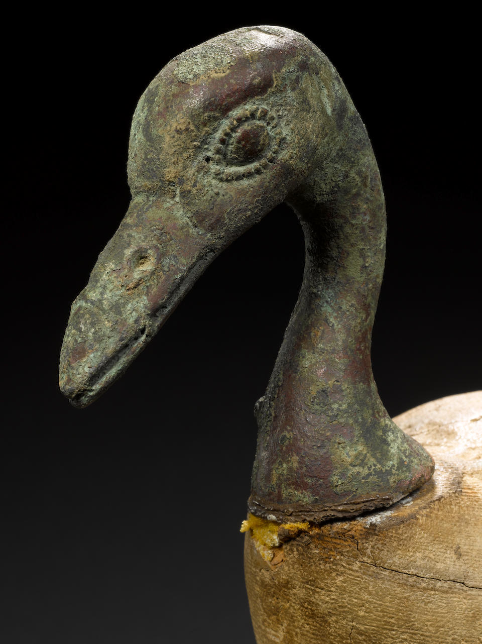 An Egyptian wood and bronze goose