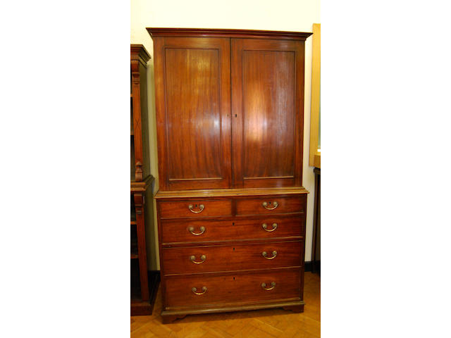 A small George III mahogany linen press on associated chest