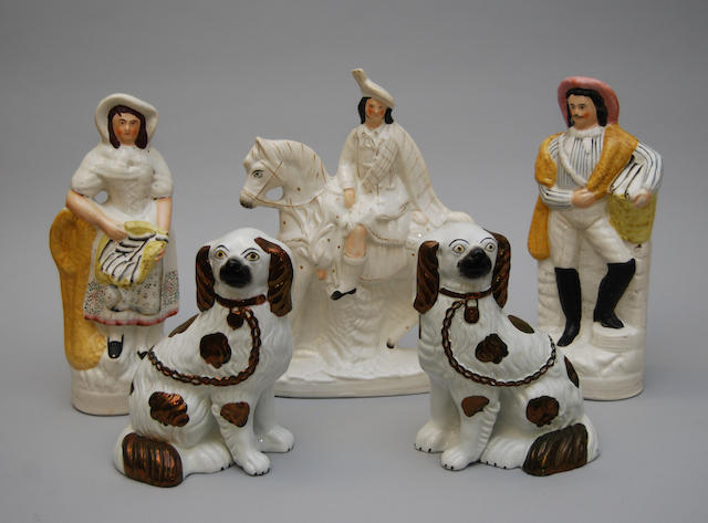 A group of Staffordshire pottery figures