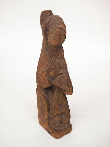 A carved oak figureProbably 16th Century