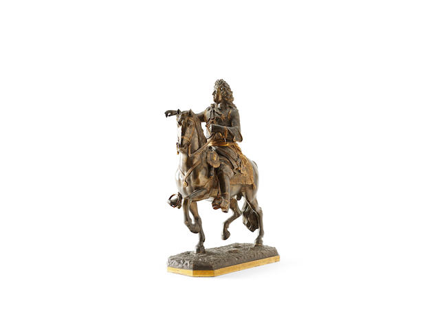A 19th Century bronze equestrian figure group of Louis XIV