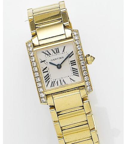 Cartier. A lady's 18ct gold and diamond set quartz bracelet watch together with a fitted box and papersTank Francaise, Reference 2385, Case Number 883391CD, Sold 16th April 2005