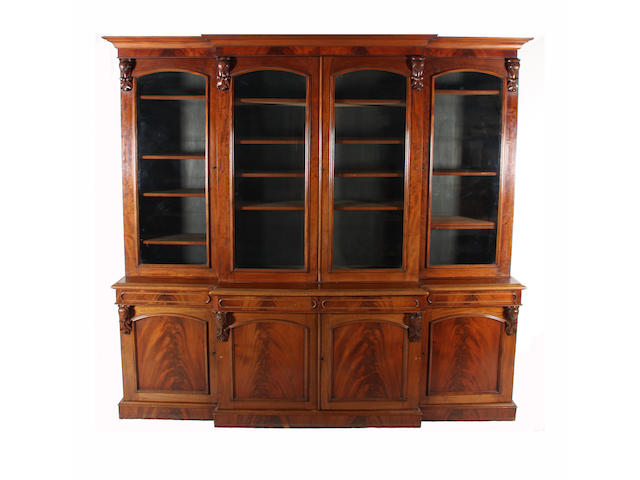 A mid-Victorian figured mahogany breakfront library bookcase