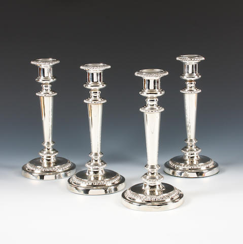 A set of four George III silver candlesticks By Mathew Boulton, Birmingham, 1827,  (4)