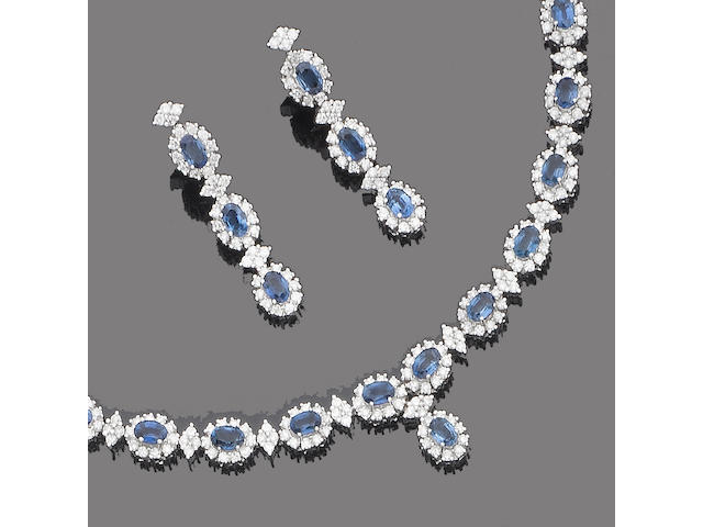 A sapphire and diamond necklace, bracelet, pendent earring and ring suite (4)