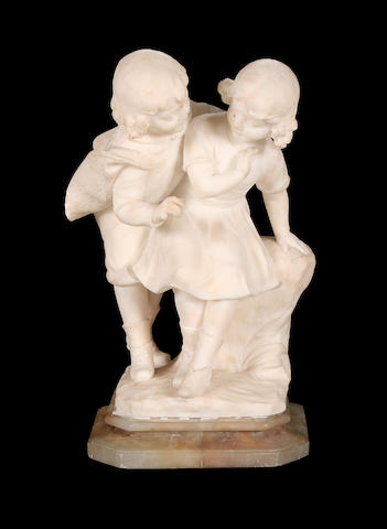 An early 20th century Italian carved alabaster figural group of two children