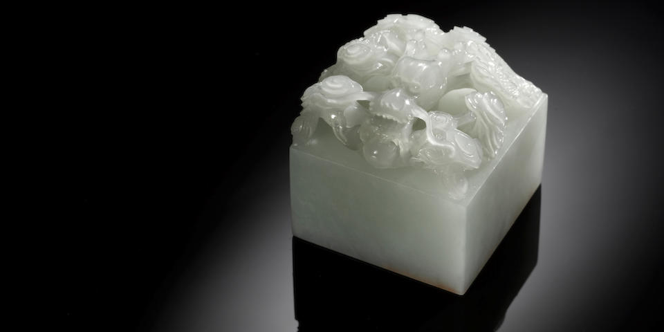 An important Imperial white jade 'Zi Qiang Bu Xi' seal Qianlong