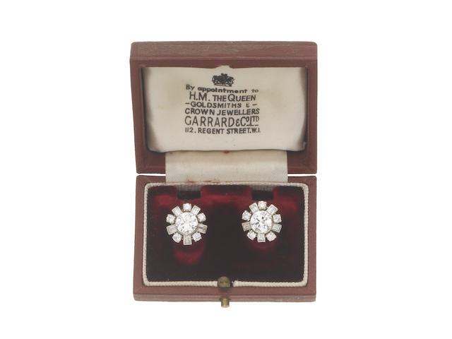 A pair of diamond cluster earrings (illustrated above)