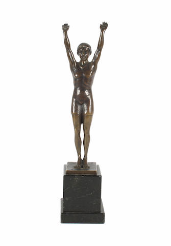 A patinated bronze figure of a male swimmer