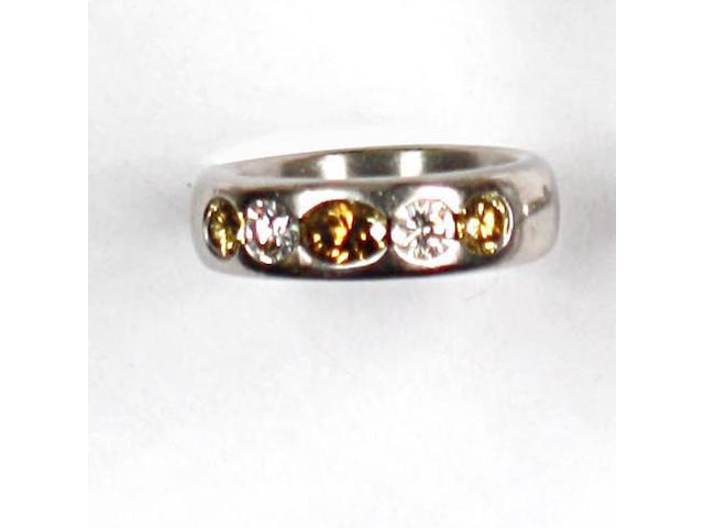 A diamond and coloured diamond ring